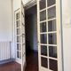 Triptych glass door with three panels featuring small panes. Vintage.