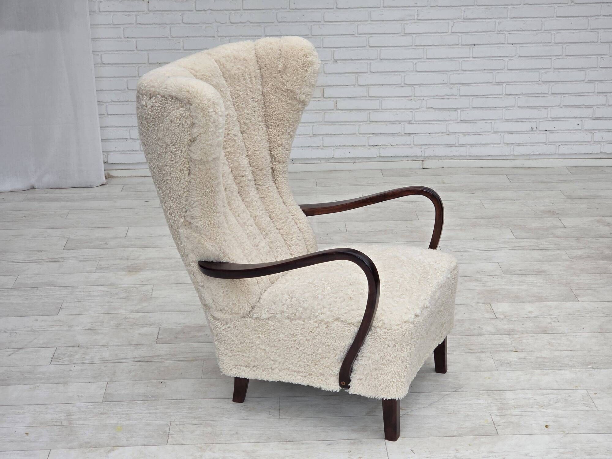 1960s, Danish high-back armchair, genuine sheepskin, reupholstered.