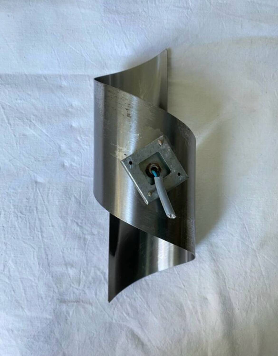 Brushed stainless steel wall light by Oxar France