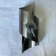 Brushed stainless steel wall light by Oxar France