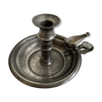 Tin candlestick with extinguisher