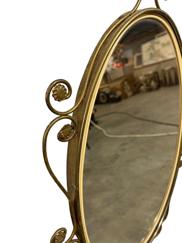 Vintage gold oval wall mirror