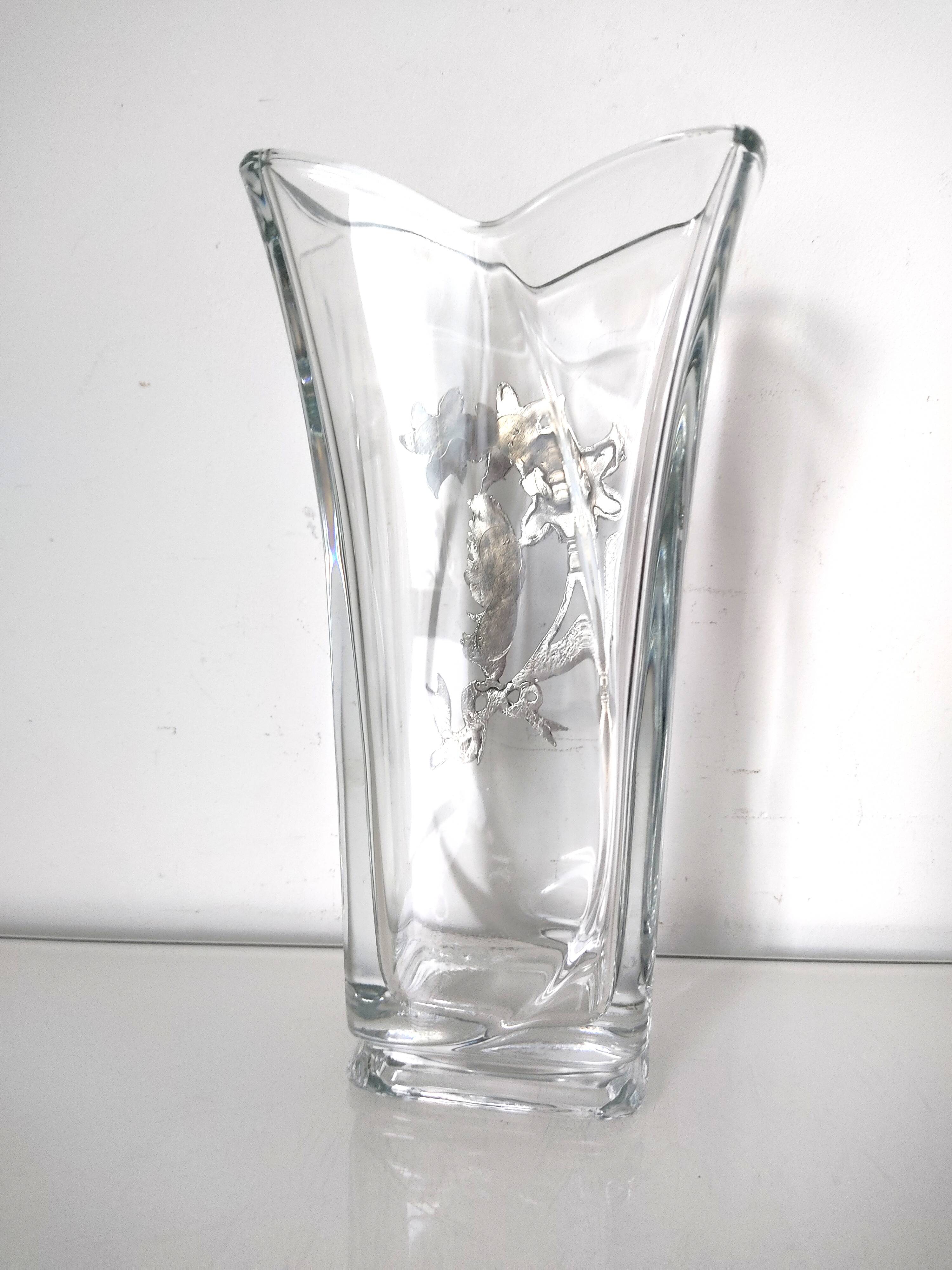 Glass vase with metal flower application