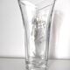 Glass vase with metal flower application