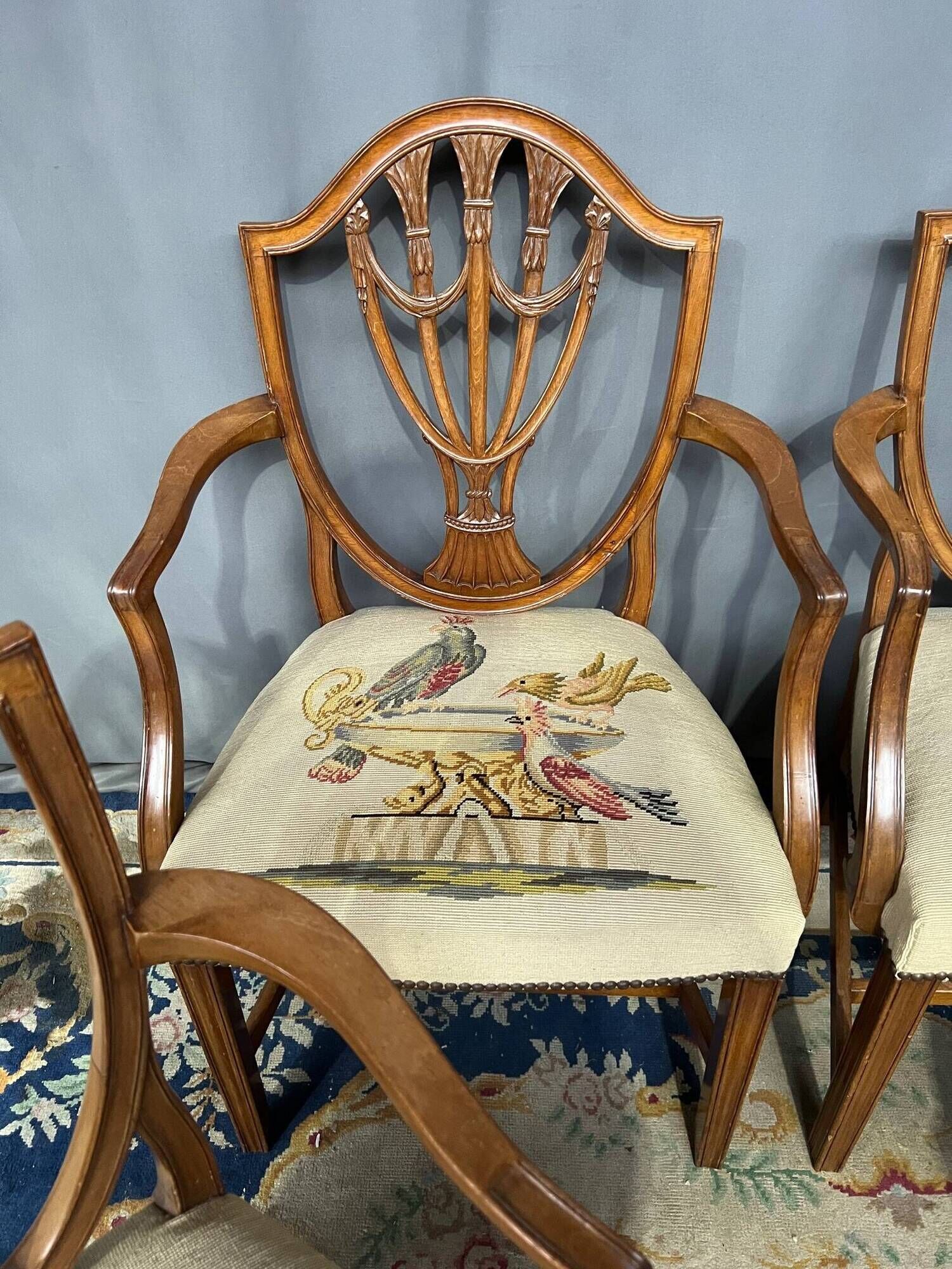Set of four Sheraton-style armchairs. Solid walnut.