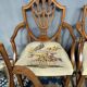 Set of four Sheraton-style armchairs. Solid walnut.