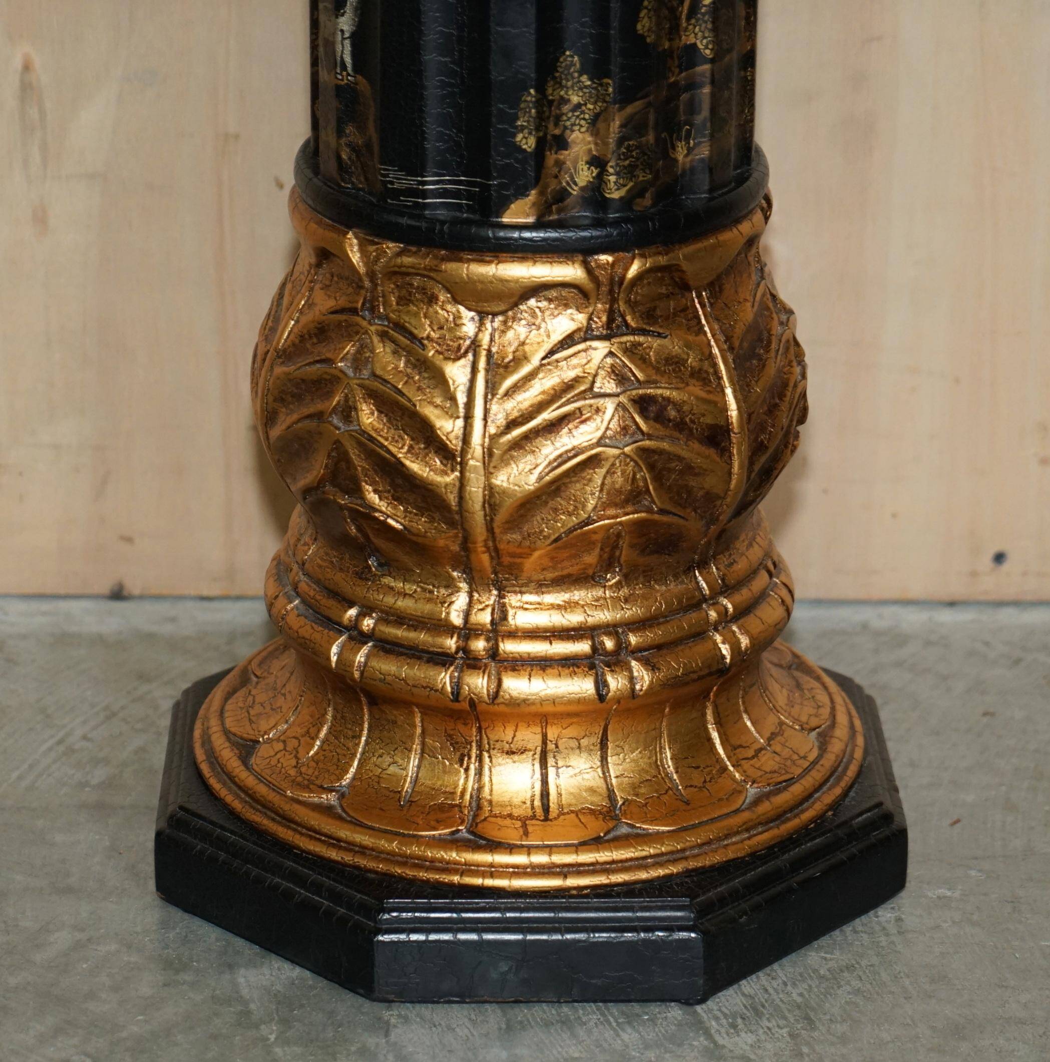Pair of lacquered torchère columns in Chinoiserie neoclassical style.