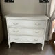 Chest of drawers with 3 curved legs