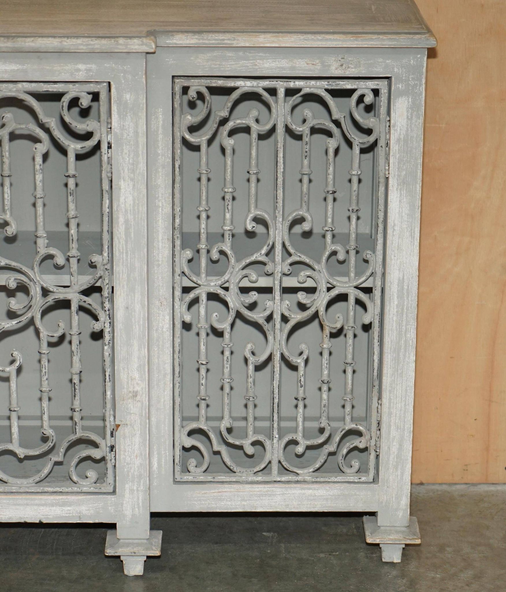 Vintage sideboard with wrought iron doors