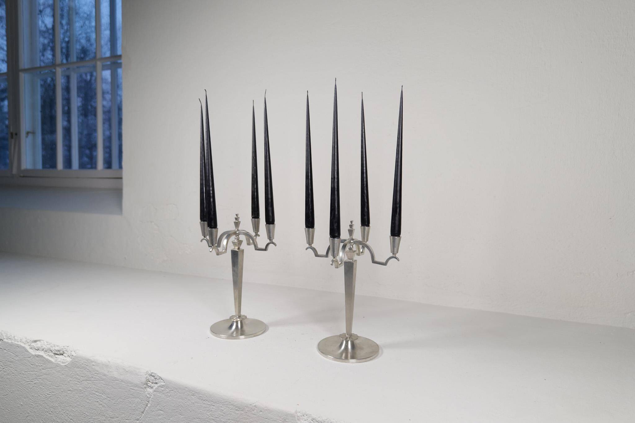 Sculptural Art Deco set of chandeliers in tin, Sweden, 1940s.
