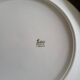 Lot of 8 small porcelain bread plates.