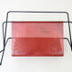 Fifties perforated metal magazine rack