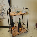 Wicker and vintage black metal trolley