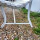 Old garden bench with metal legs and wooden slats