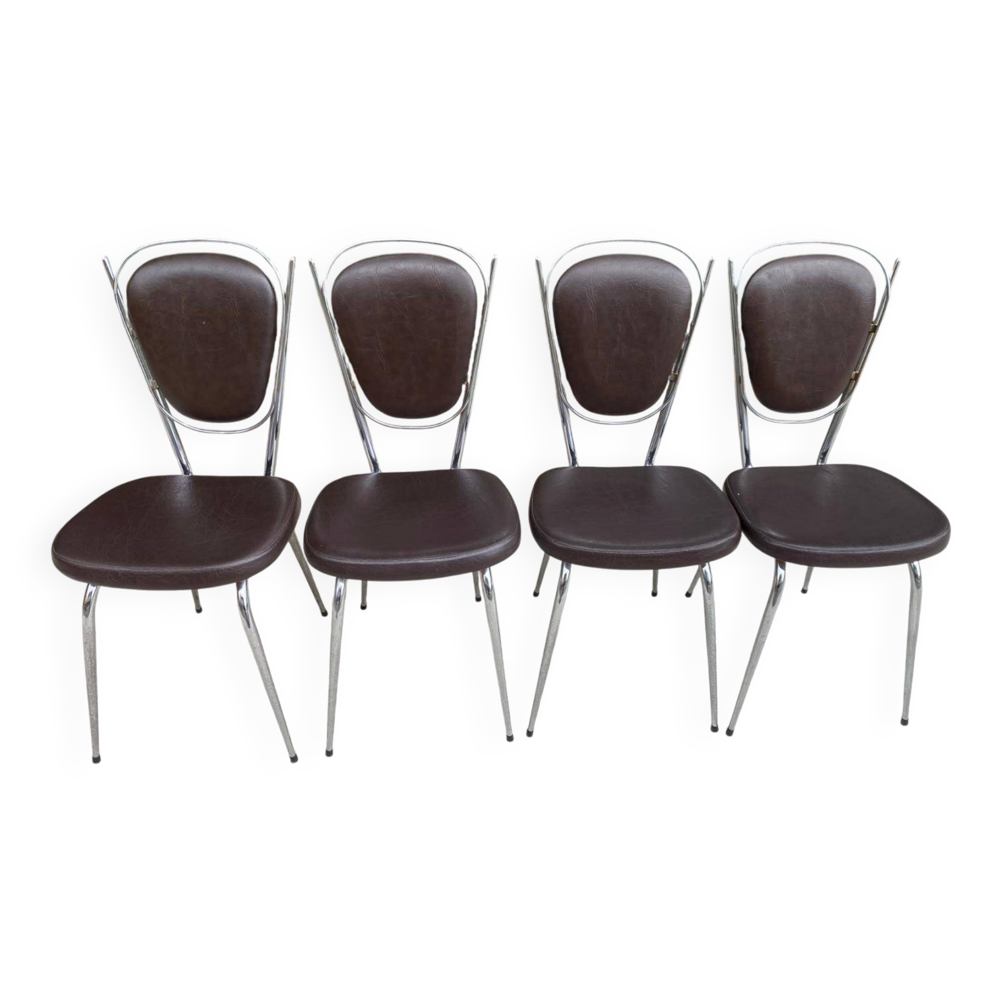 Set of 4 vintage chairs from the 60s/70s in brown faux leather with chrome compass legs.