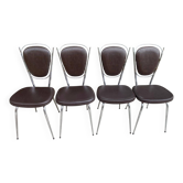 Set of 4 vintage chairs from the 60s/70s in brown faux leather with chrome compass legs.