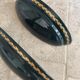 Set of two vintage wall sconces in pine green and gold.