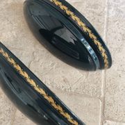 Set of two vintage wall sconces in pine green and gold.