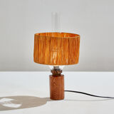 Table lamp with raffia shade