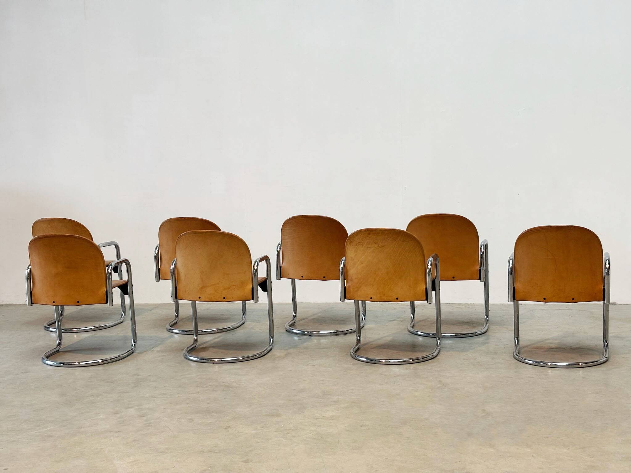 Set of eight cognac leather Dialogo Dessau dining chairs by Afra E Tobia Scarpa