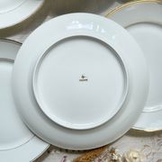 6 Small vintage French plates in golden white Limoges porcelain