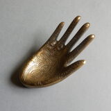 Empty-pocket brass hand