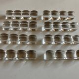 Set de 8 porte couteaux coussins modernistes en cristal sonnant 1940