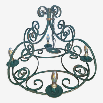 Four-light wrought iron pendant lamp with its green/gold patina