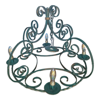 Four-light wrought iron pendant lamp with its green/gold patina