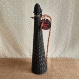 Glass bottle covered with black scoubidou with twisted golden handle - vintage