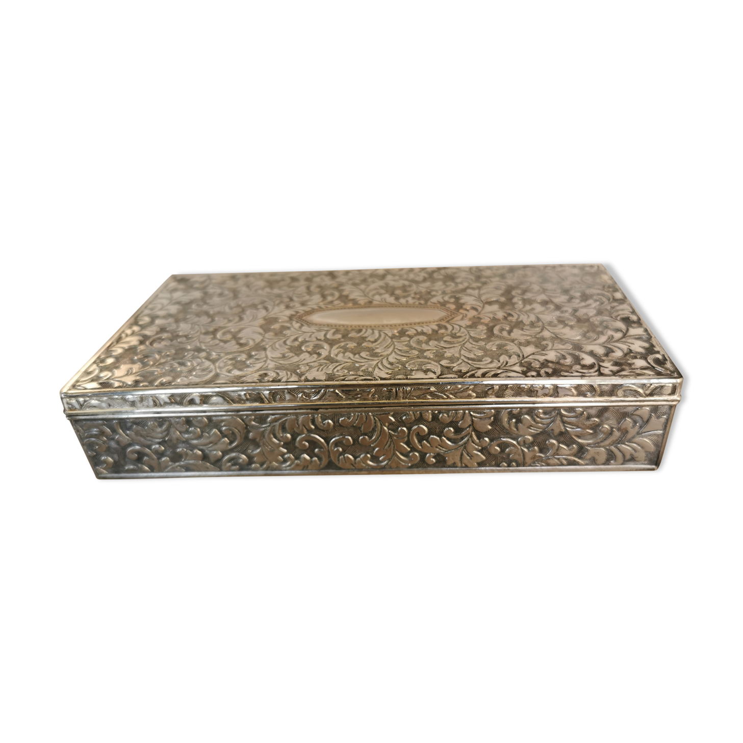 Old box in chiseled silver metal