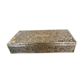 Old box in chiseled silver metal