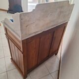 Old bathroom cabinet with marble