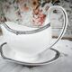 Sauce boat on a porcelain base in English Wedgwood model Amherst.