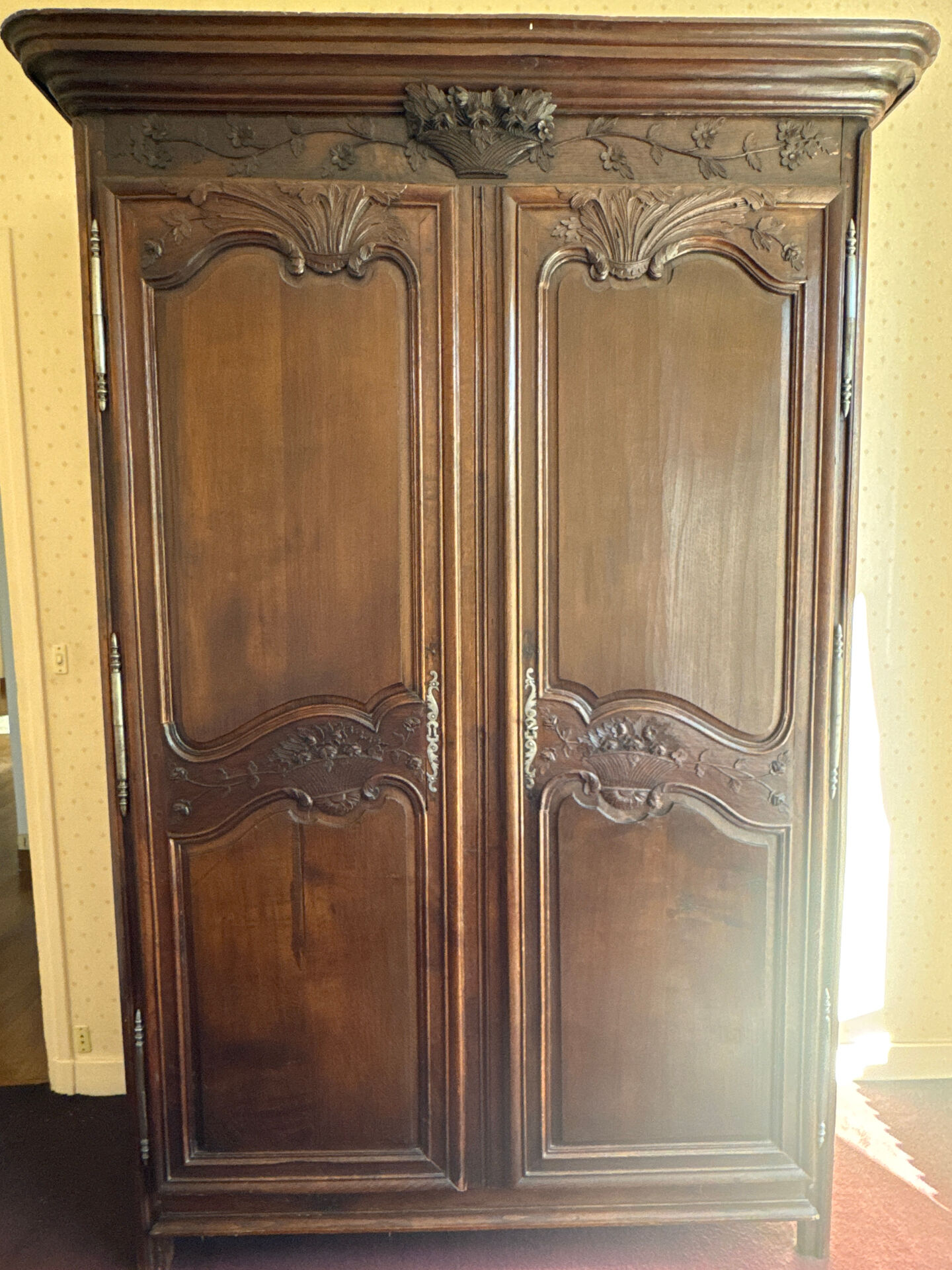 Carved plant armoire