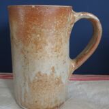 Suite of five sandstone mugs