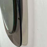 Vintage mirror with smoked glass frame from the 1970s.