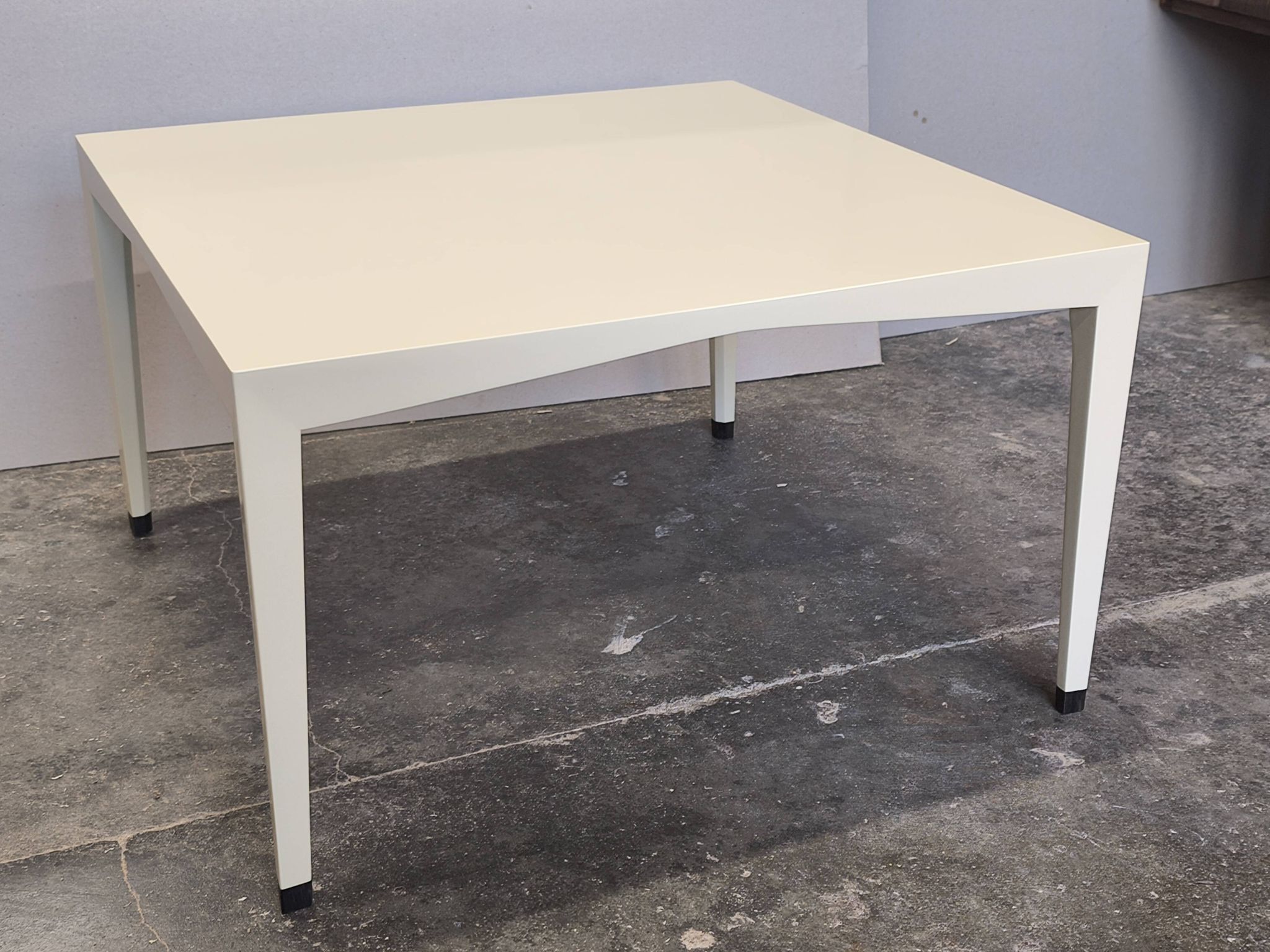 Valzania Edition ivory lacquered coffee table with ebony base