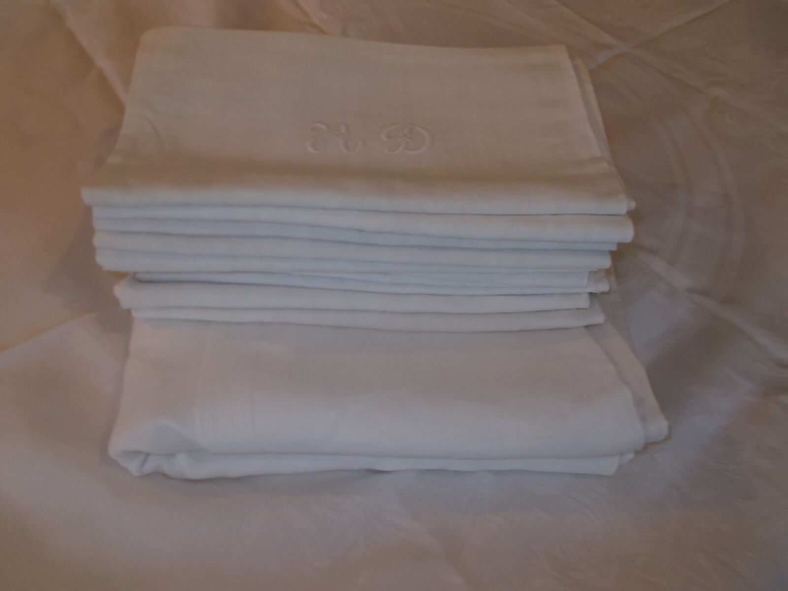 Tablecloth and 11 cotton/linen towels embroidered AD circa 1900