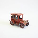 Vintage tin car with pull lever