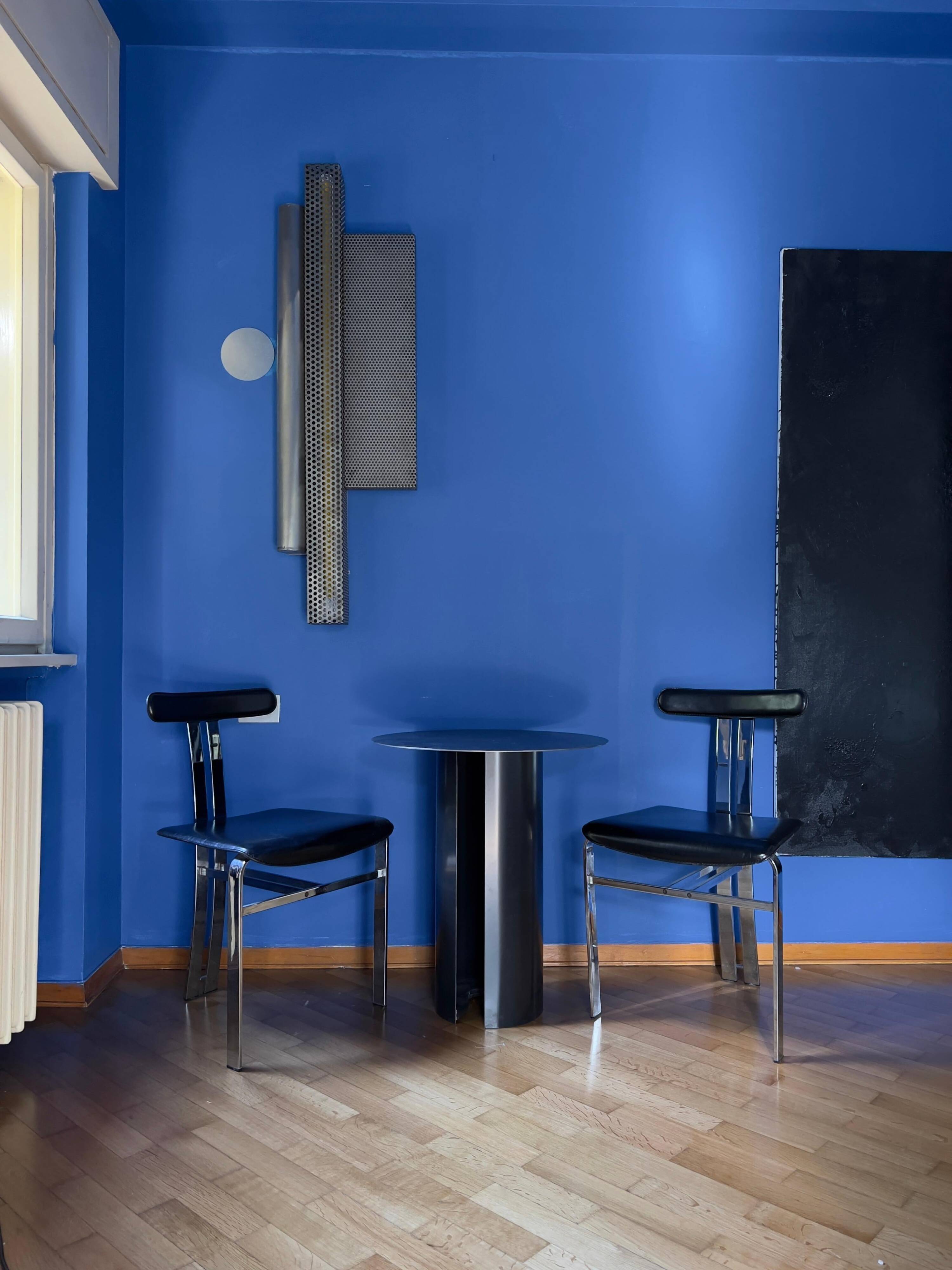 Pair of vintage Italian made dining chairs in chromed metal and black leather