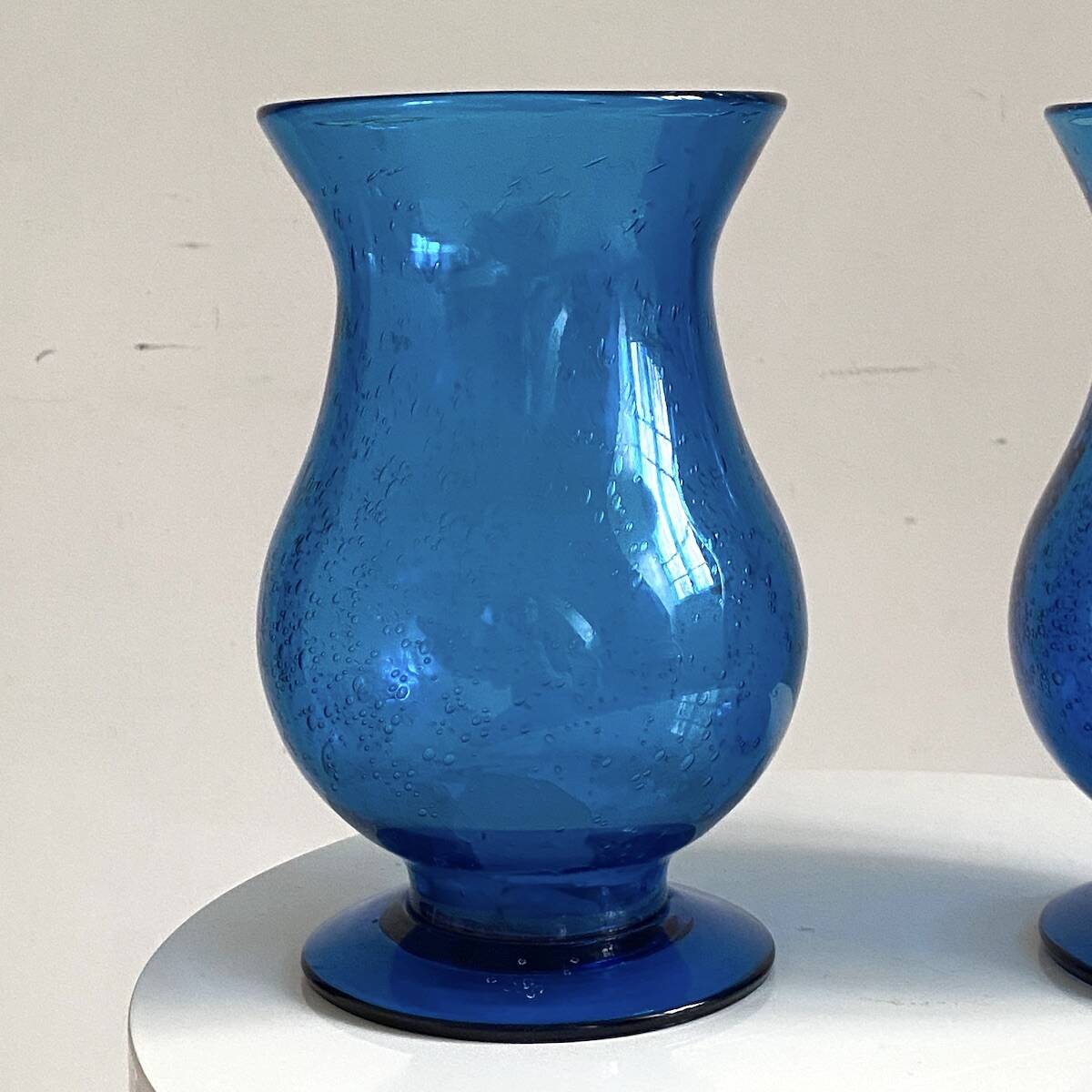 Pair of candle holders from the Biot glassworks, height 22 cm, diameter 15 cm.