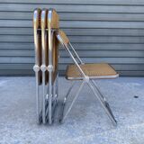 "Plia" caned chairs by Giancarlo Piretti