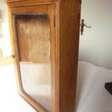 Old watchmaker's furniture wall display case