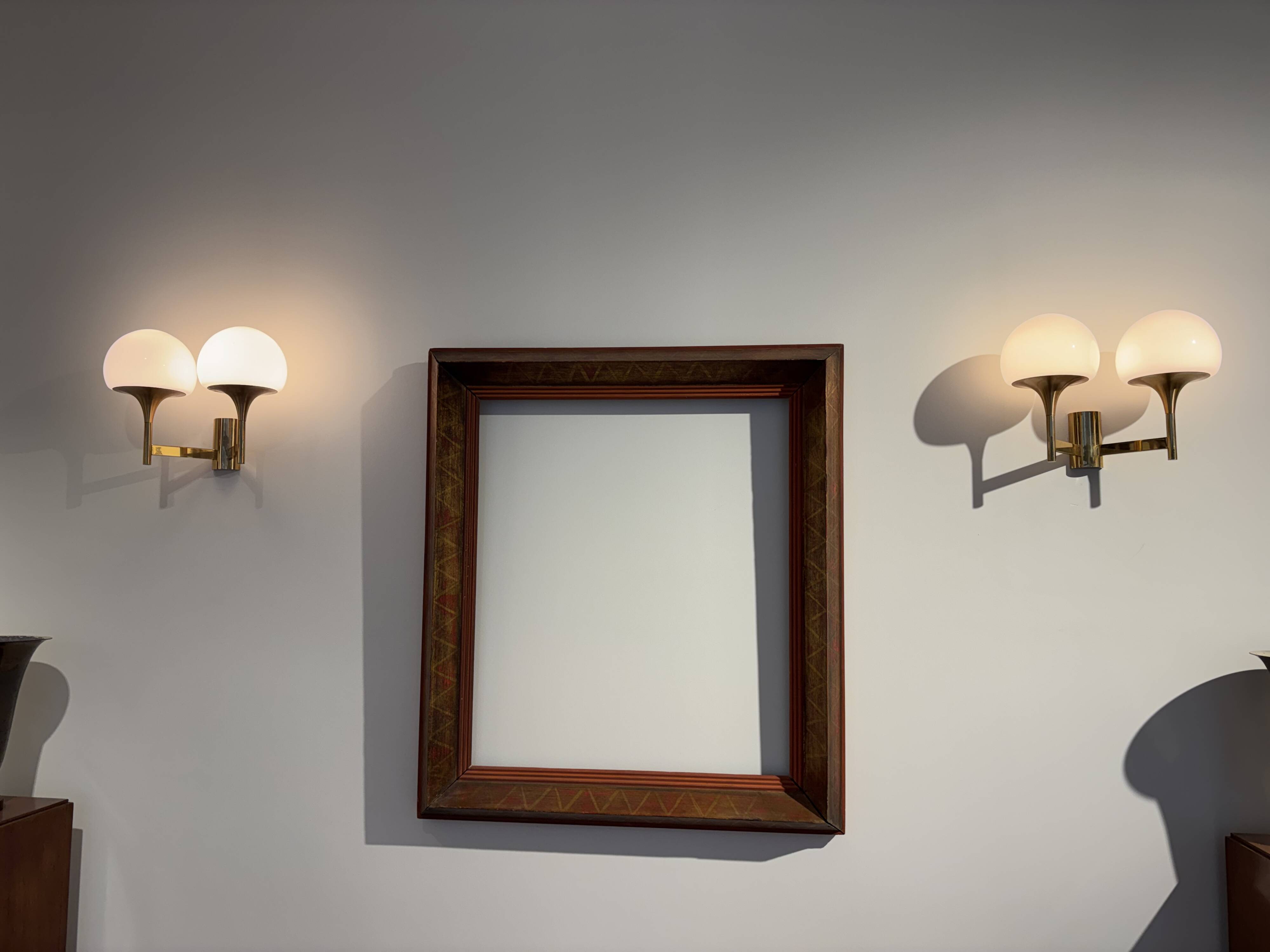 Golden metal wall light and opaline, 1970