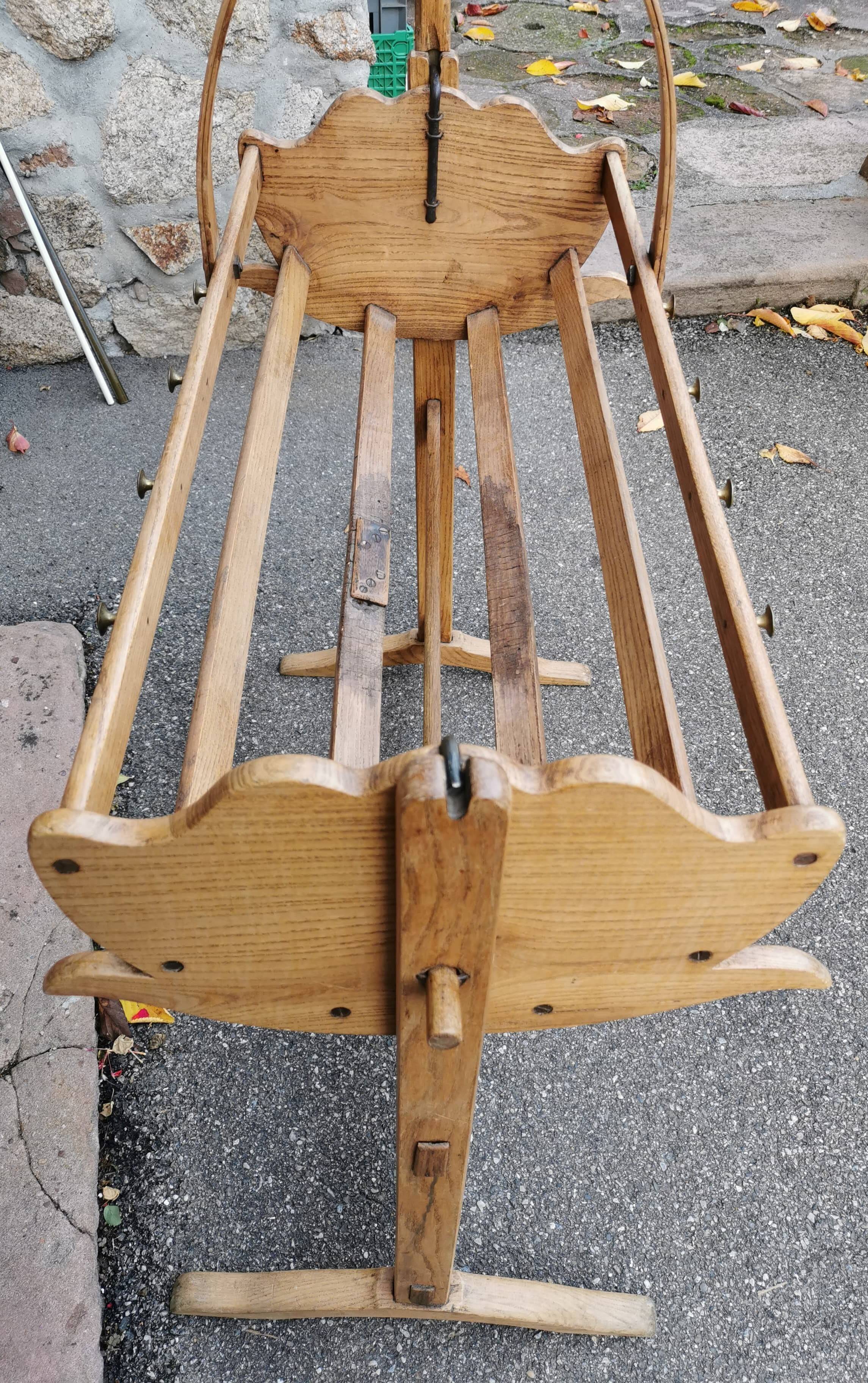 Old cradle with solid oak canopy