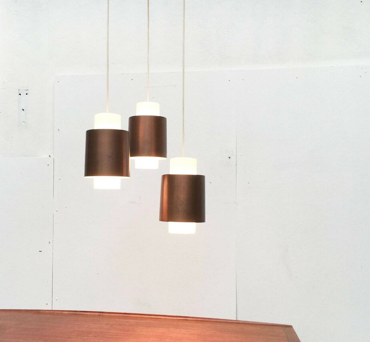 Triple cascade pendant lamp in copper and glass from the modern German space age of the mid-century by Staff, 1960s.