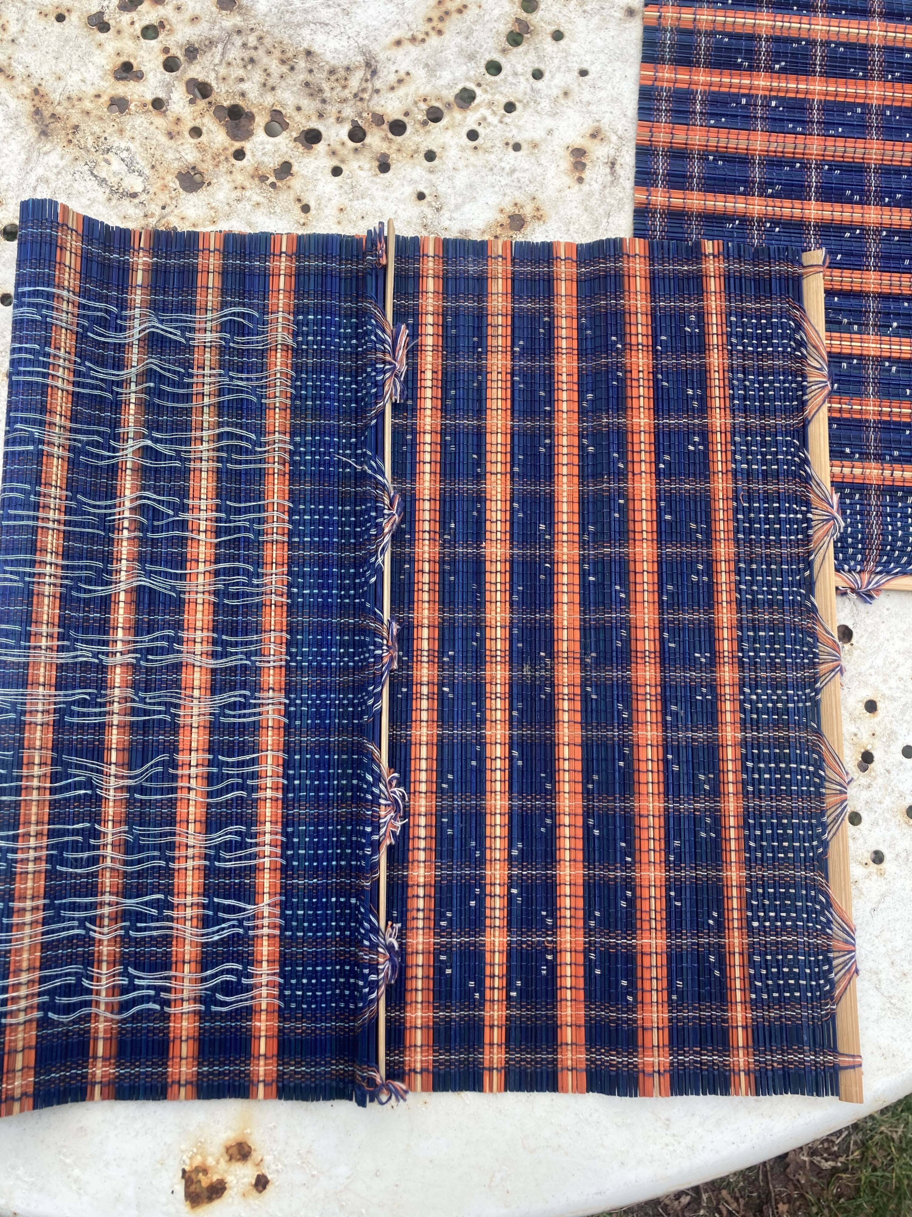 4 blue wicker placemats