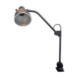 Industrial in height to be adjusted vintage clamp lamp from the 1970s