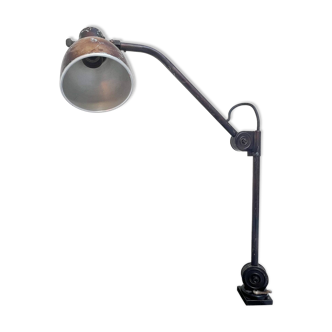 Industrial in height to be adjusted vintage clamp lamp from the 1970s